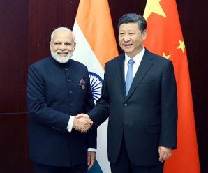 Xi, Modi vow close cooperation