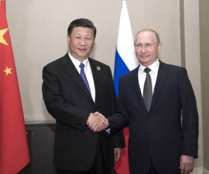 Xi: China, Russia should enhance ties, boost role of SCO