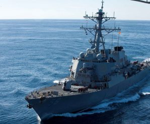 US destroyer in South China Sea violated law, harmed security