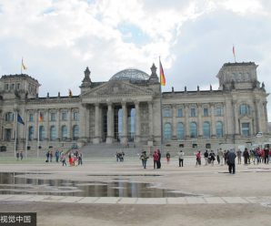 China warns tourists to respect local laws after two held for Nazi salutes in Germany