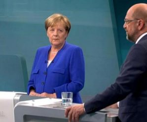 Merkel defends refugee policy as Schulz attacks in TV debate