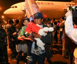 Chinese head home after hurricane