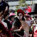 Day of Dead parade honors Mexican quake victims, rescuers