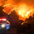 Firefighters wrestle to control wildfire