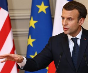 Macron plans tighter asylum rules in test of majority