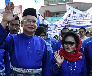 Former Malaysian PM Najib, wife banned from leaving country